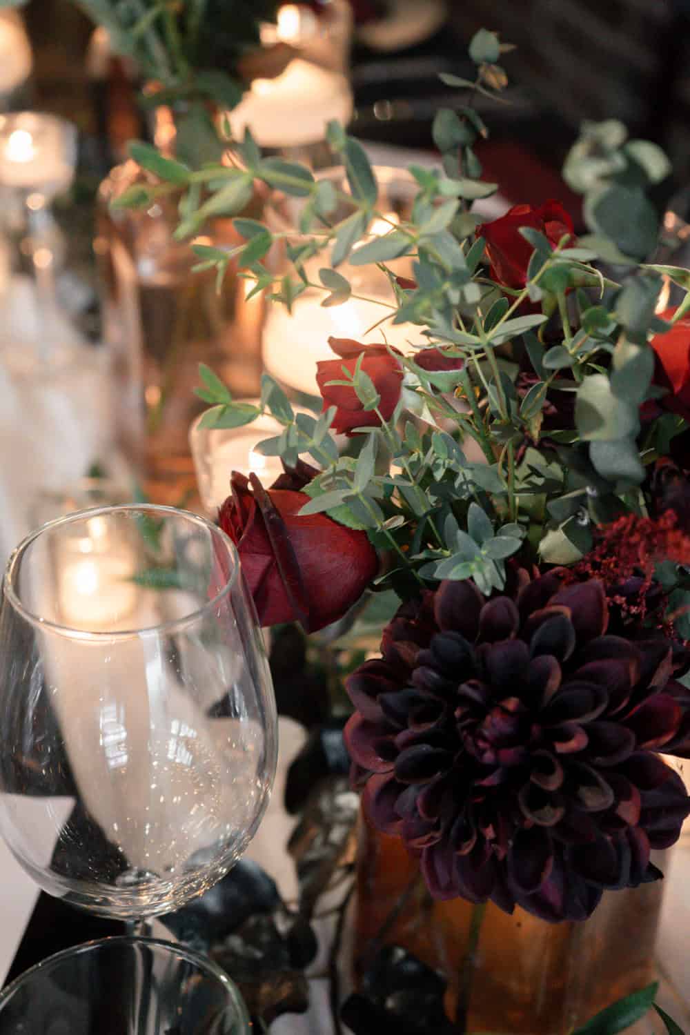 Beautiful floral centerpiece with roses and greenery for special occasions.