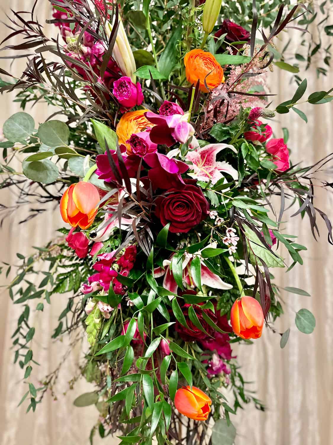 Vibrant mixed flower bouquet with roses, tulips, and lilies for SKY Armory event.