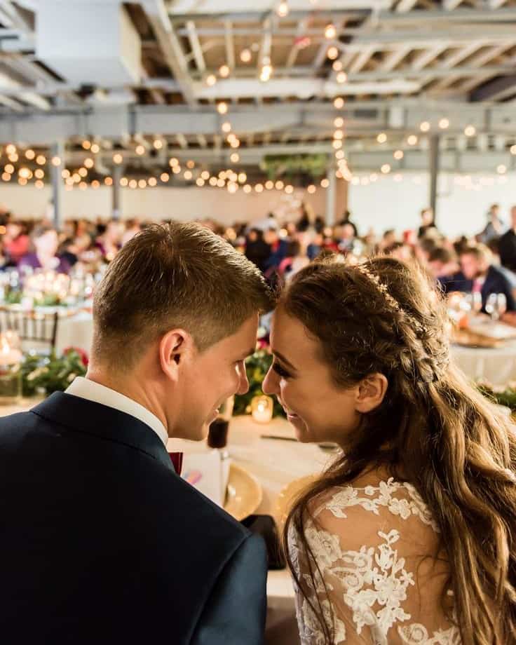 Bride and groom sharing a moment at SKY Armory wedding reception.
