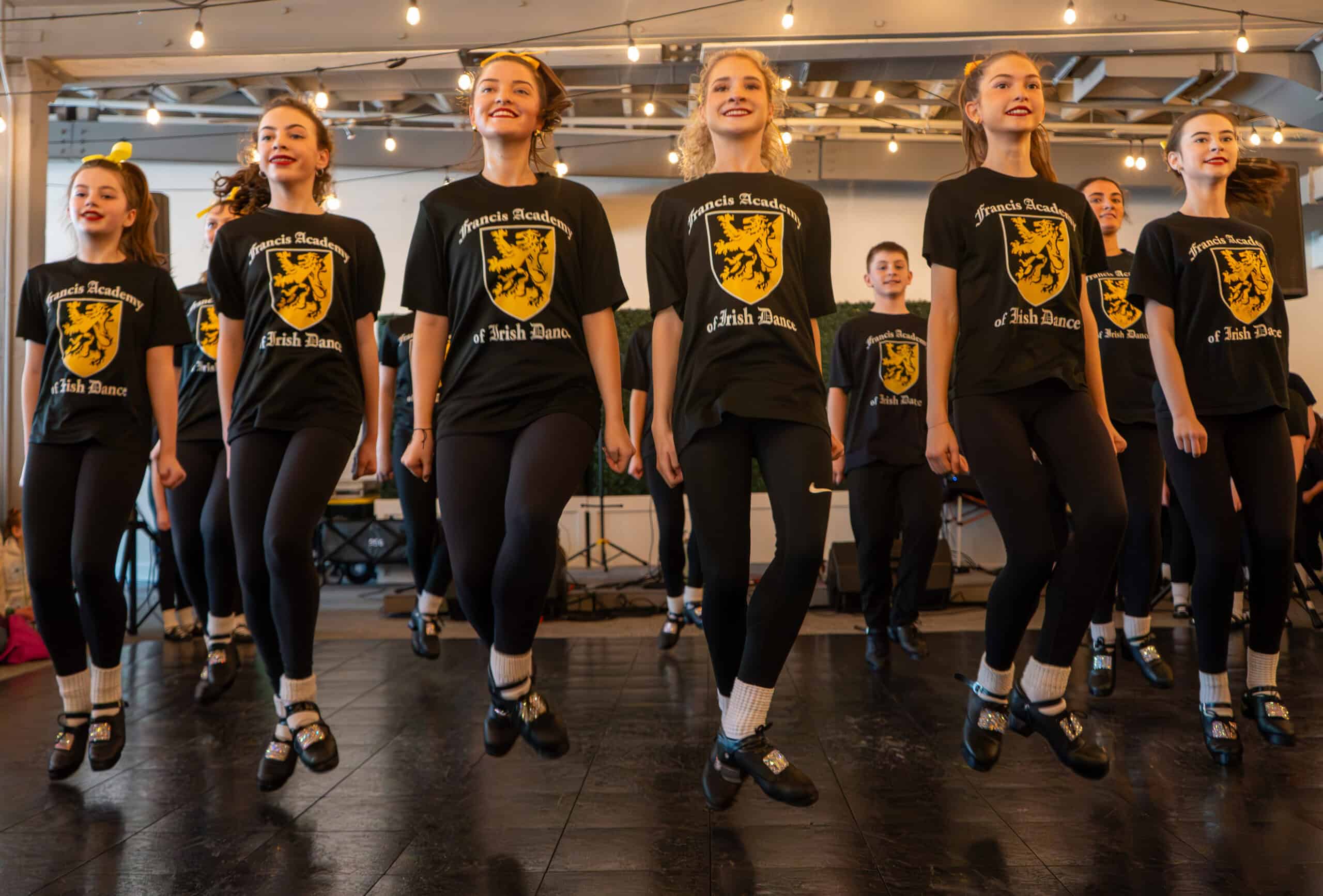 Group of dancers performing at SKY Armory during Syracuse Parade Day.