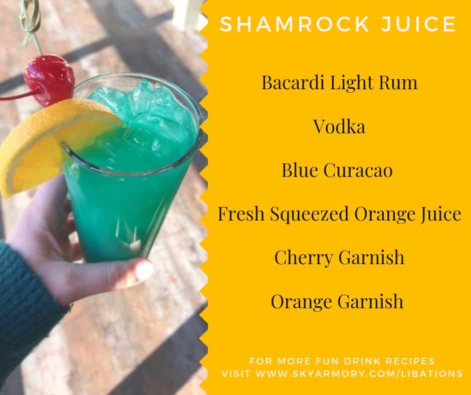 Colorful Shamrock Juice cocktail with lemon and cherry garnish.