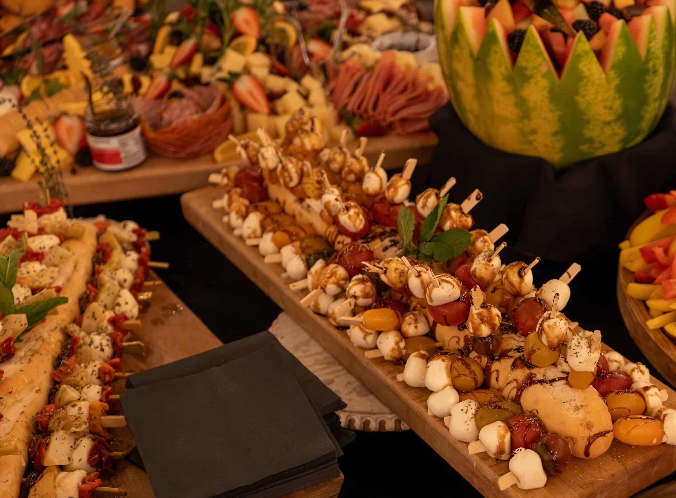 Assorted gourmet skewers and appetizers at SKY Armory event.