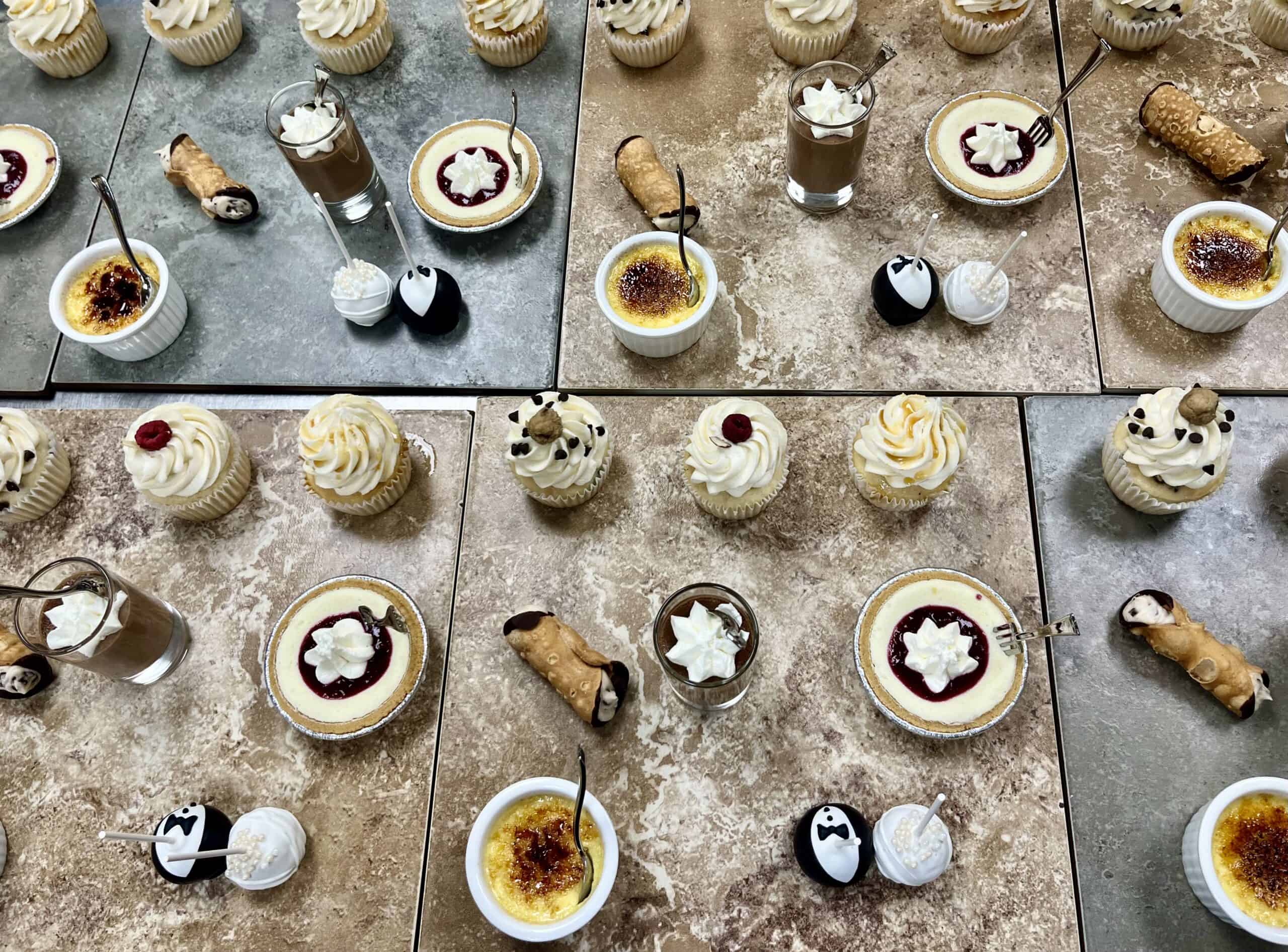 Assorted desserts and drinks on a rustic table for SKY Armory.