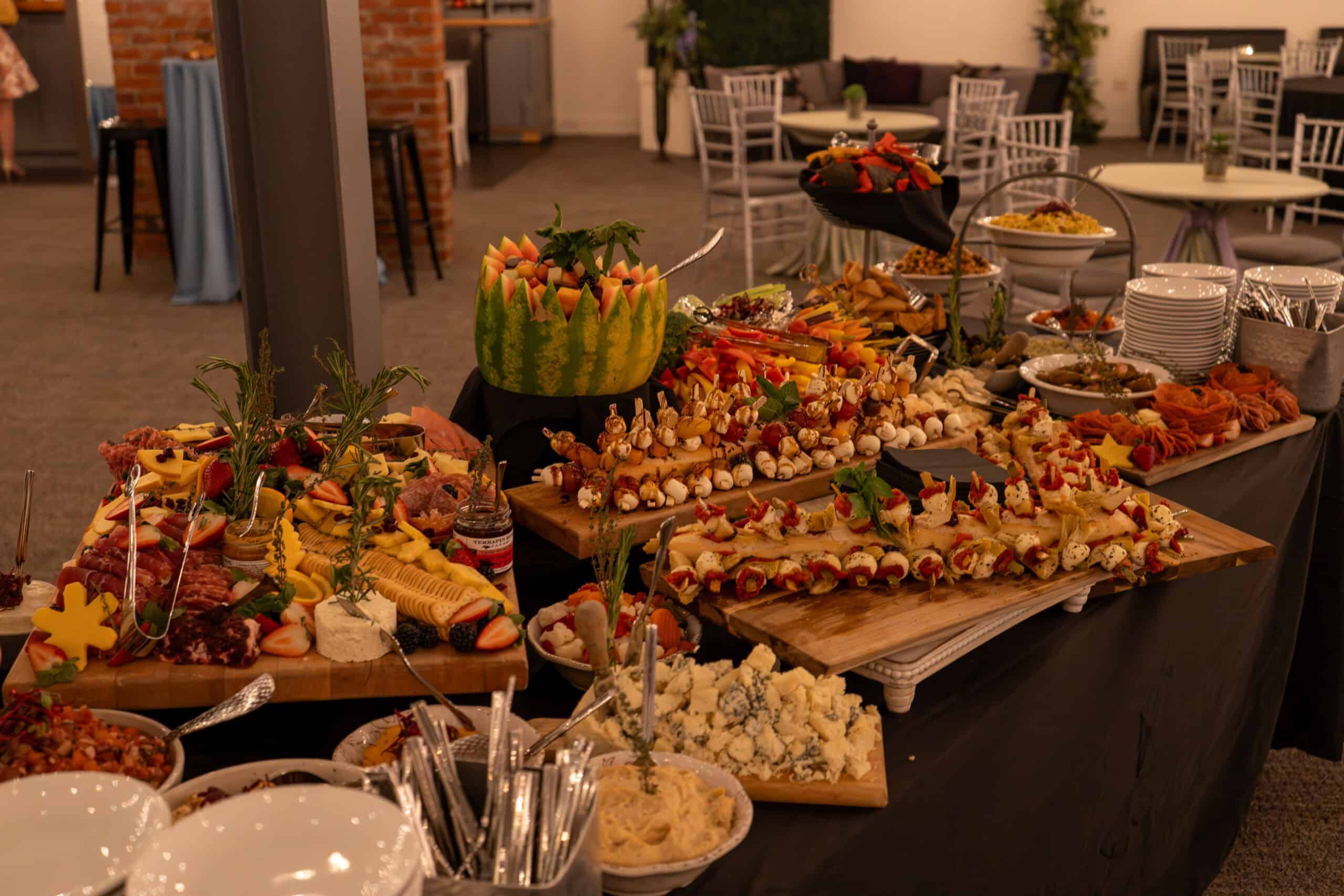 Variety of gourmet appetizers and desserts at Sky Armory event.