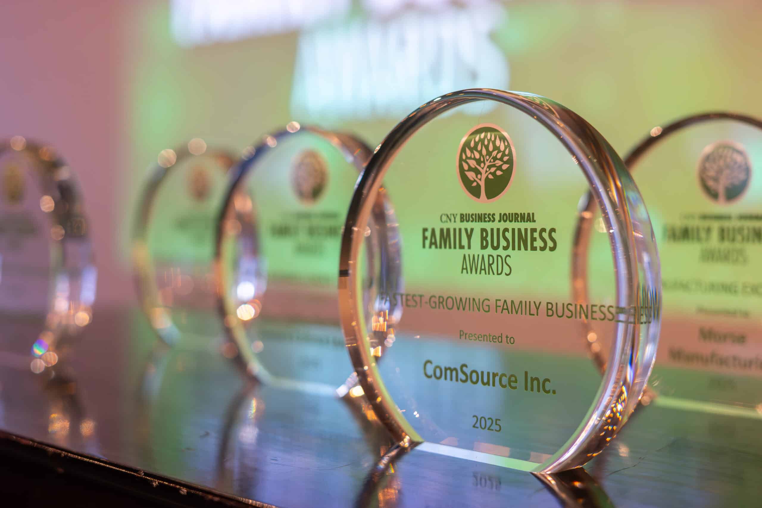 Family Business Awards 2025 glass trophy for ComSource Inc.