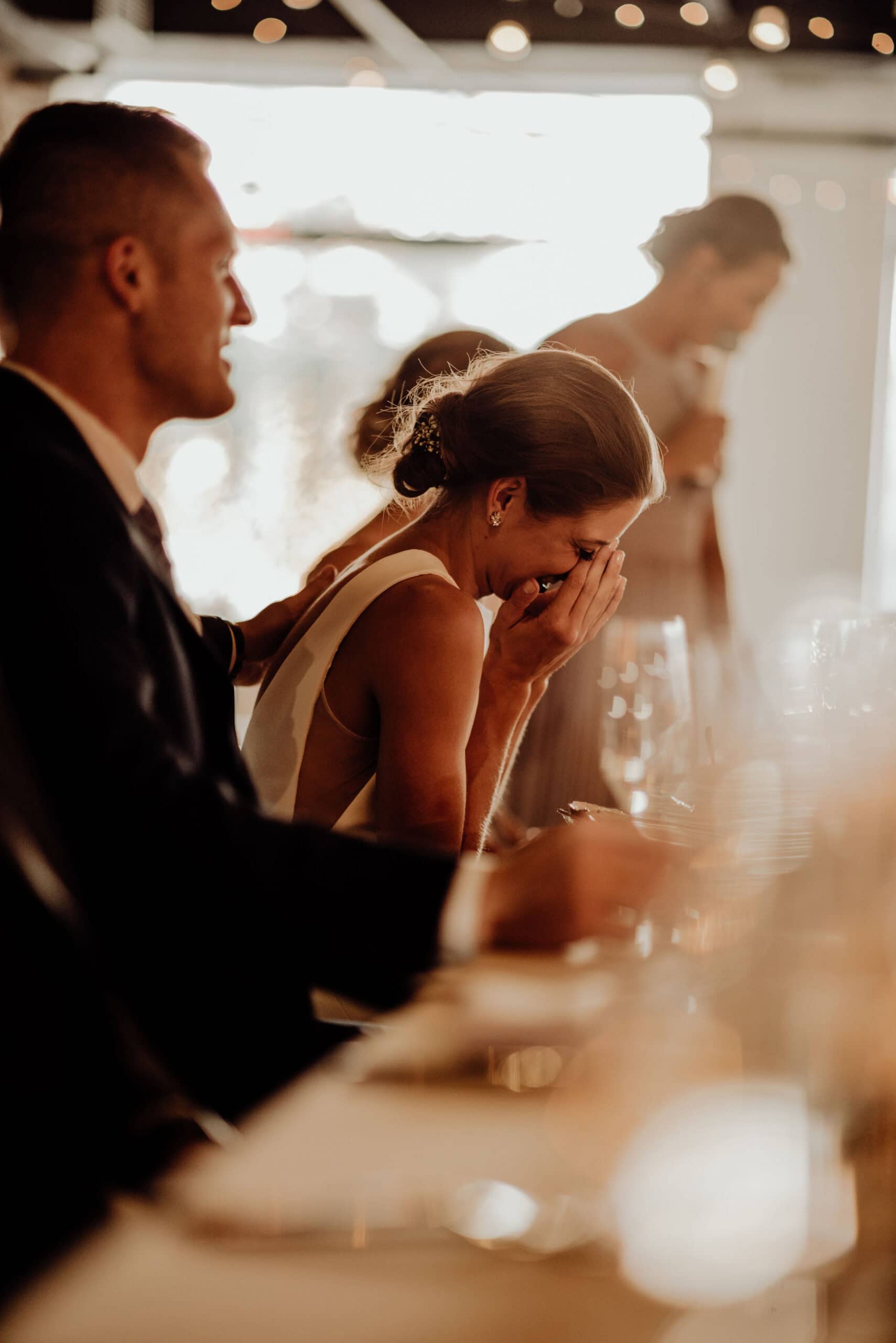 Bride crying during wedding reception at SKY Armory in Brooklyn.